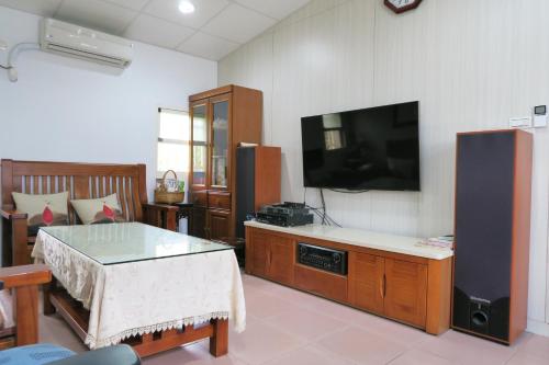Shared lounge/TV area, Boanju Homestay in Lucao Township Shared lounge/TV area, Boanju Homestay in Lucao Township