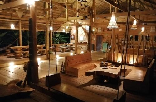 Shared lounge/TV area, Fandee Island - Tad Lo - Bolaven Loop Pakse in Beng Shared lounge/TV area, Fandee Island - Tad Lo - Bolaven Loop Pakse in Beng