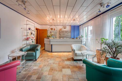 Фойє, Hotel Horizont GmbH in Нойбранденбург Фойє, Hotel Horizont GmbH in Нойбранденбург