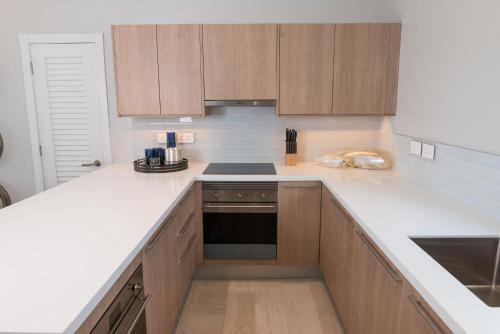 Kitchen, Blue Lace Condo Suite Grenada in Lower Woburn Kitchen, Blue Lace Condo Suite Grenada in Lower Woburn