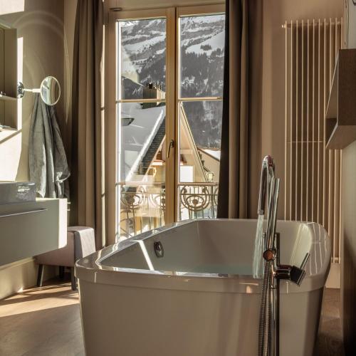 Bathroom, Bellevue-Terminus - Urban Lifestyle Hotel in Engelberg Bathroom, Bellevue-Terminus - Urban Lifestyle Hotel in Engelberg