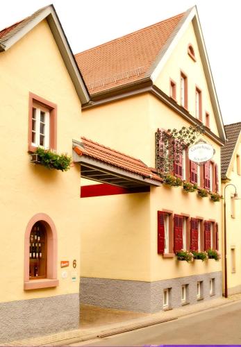 Exterior view, Gastehaus Schmitt und Tacheles Landrestaurant in Florsheim-Dalsheim Exterior view, Gastehaus Schmitt und Tacheles Landrestaurant in Florsheim-Dalsheim