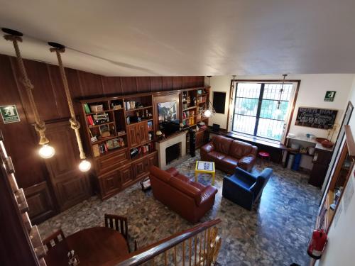 gedeelde lounge/tv-ruimte, Mucha Masia Hostel Rural Urba near Barcelona-El Prat Airport gedeelde lounge/tv-ruimte, Mucha Masia Hostel Rural Urba near Barcelona-El Prat Airport