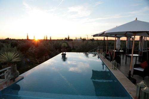 This photo about Le Clos des Oliviers Marrakech shared on HyHotel.com