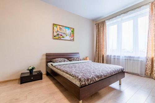 سرير, Родина DreamHouse Апартаменты in Yekaterinburg سرير, Родина DreamHouse Апартаменты in Yekaterinburg