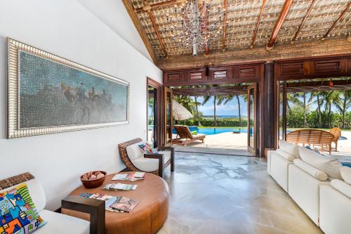 Balcony/terrace, Unique Villa with Ocean and River Views - Staff & Golf Carts in La Romana Balcony/terrace, Unique Villa with Ocean and River Views - Staff & Golf Carts in La Romana