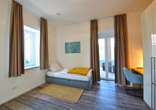 Boardinghouse am Welzbach in Gau-Algesheim Boardinghouse am Welzbach in Gau-Algesheim