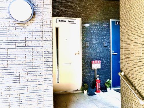 Entrance, Midtown Sakura Apartment House 101 予約者だけの空間 A space just for you in Nachikatsuura Entrance, Midtown Sakura Apartment House 101 予約者だけの空間 A space just for you in Nachikatsuura