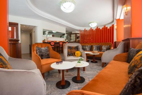 Bar/ Salón, Hotel Olympia in Beausoleil Bar/ Salón, Hotel Olympia in Beausoleil