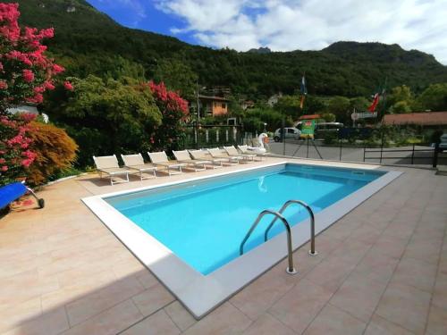 Swimming pool, Villaggio Turistico Il Lago Dorato in Carlazzo Swimming pool, Villaggio Turistico Il Lago Dorato in Carlazzo