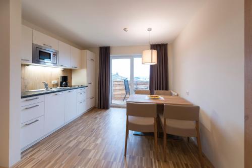 廚房, 松內霍夫公寓 (Appartementhotel Sonnenhof) in 科森 廚房, 松內霍夫公寓 (Appartementhotel Sonnenhof) in 科森