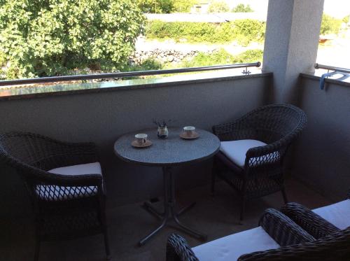 balkon/terras, Apartman Sinikovic in Barusici balkon/terras, Apartman Sinikovic in Barusici