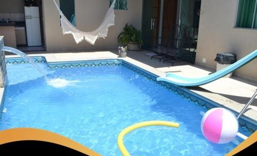 مسبح, Linda Casa com Sauna, Hidromassagem, Piscina, Cascata, Churrasqueira e Suite Master!! in Popular مسبح, Linda Casa com Sauna, Hidromassagem, Piscina, Cascata, Churrasqueira e Suite Master!! in Popular