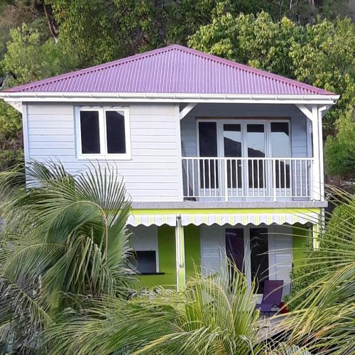 Фасада на хотела, Logement Terre de Haut avec SPA privé - Villa Cana (Logement Terre de Haut avec SPA prive - Villa Cana) in Terre-de-Haut Фасада на хотела, Logement Terre de Haut avec SPA privé - Villa Cana (Logement Terre de Haut avec SPA prive - Villa Cana) in Terre-de-Haut