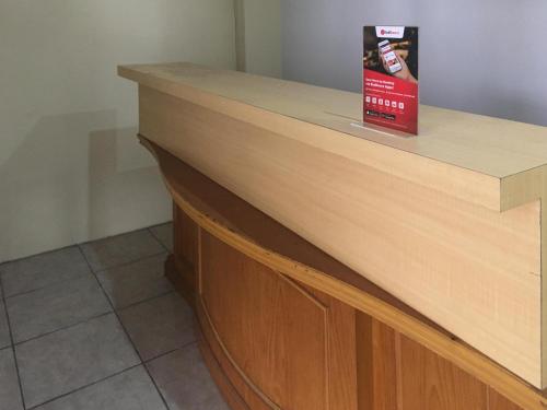 Entrance, RedDoorz near Institut Kesehatan Helvetia in Medan Helvetia Entrance, RedDoorz near Institut Kesehatan Helvetia in Medan Helvetia