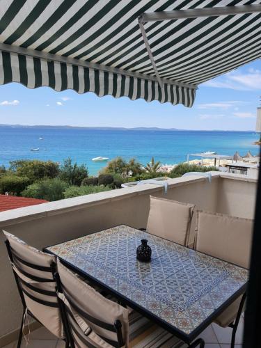 Hotel Apartment next to beach with AC, WiFi, parking