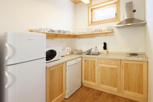 Konyha, Family Panzio es Apartman Hazak in Lipót Konyha, Family Panzio es Apartman Hazak in Lipót