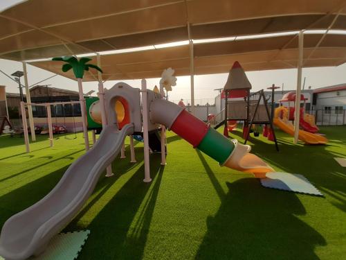 Parc infantil, Daraysh Hotel in Dhaid Parc infantil, Daraysh Hotel in Dhaid