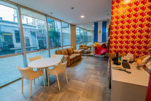 ห้องส่วนกลางสำหรับนั่งเล่น/ดูทีวี, Roberta Rosa De Fontana Suites in โรซาริโอ ห้องส่วนกลางสำหรับนั่งเล่น/ดูทีวี, Roberta Rosa De Fontana Suites in โรซาริโอ