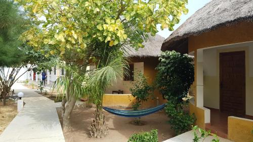 Erkély/terasz, Le Petit Quartier " Chez Amanthia" in Cap Skirring Erkély/terasz, Le Petit Quartier " Chez Amanthia" in Cap Skirring