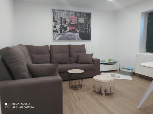 Shared lounge/TV area, Huellas Albergue-Turistico in Portomarin Shared lounge/TV area, Huellas Albergue-Turistico in Portomarin