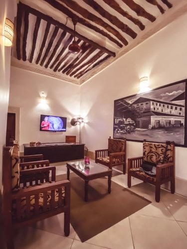 Shared lounge/TV area, Smiles Stone Town Hotel in Zanzibar Shared lounge/TV area, Smiles Stone Town Hotel in Zanzibar
