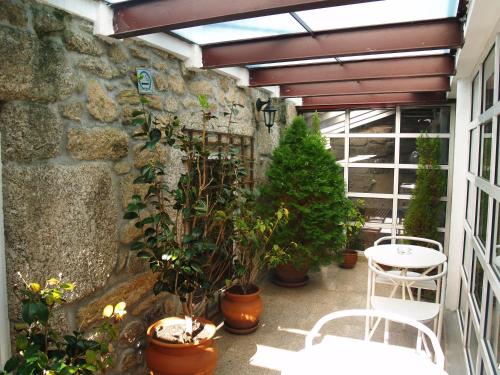 Terraza/balcón, Hotel Santos in Guarda Terraza/balcón, Hotel Santos in Guarda