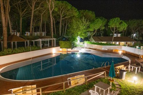 Swimming pool, Residences La Rustica & Elite in Eraclea Mare Swimming pool, Residences La Rustica & Elite in Eraclea Mare