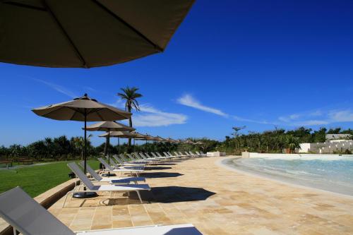 Swimming pool, Hotel Monterey Okinawa Spa and Resort in Onna Swimming pool, Hotel Monterey Okinawa Spa and Resort in Onna