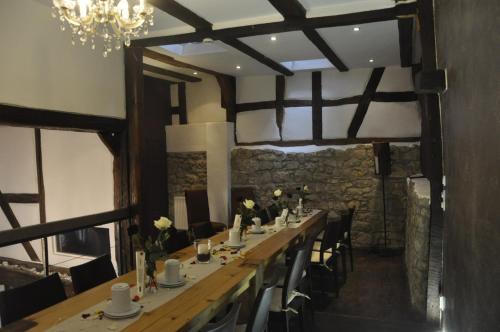 Étterem, Geibelhof - Apartments in mediterraner Hofreite nahe Frankfurt am Main in Karben Étterem, Geibelhof - Apartments in mediterraner Hofreite nahe Frankfurt am Main in Karben