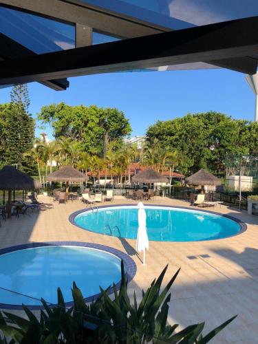 Úszómedence, LINDO APARTAMENTO NA PRAIA BRAVA in Praia Brava Úszómedence, LINDO APARTAMENTO NA PRAIA BRAVA in Praia Brava