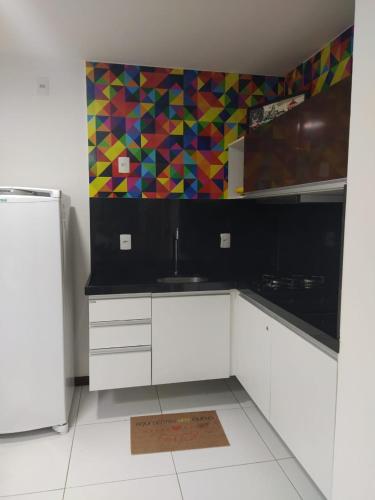 Kitchen, Apartamento quarto e sala com varanda no ILOA Residence a 10 Km da Praia do Frances e 12 Km da Praia in Maceio Kitchen, Apartamento quarto e sala com varanda no ILOA Residence a 10 Km da Praia do Frances e 12 Km da Praia in Maceio