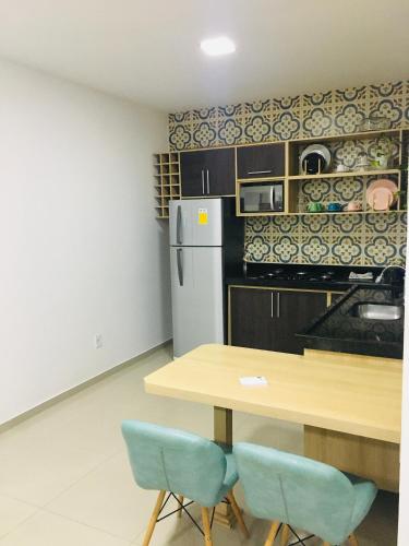 Kitchen, Arraial do Cabo Flat in Industrial Zone Kitchen, Arraial do Cabo Flat in Industrial Zone