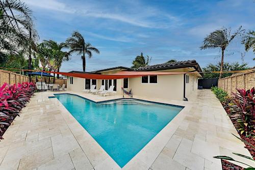 Tropical Smart Home - Heated Pool, Outdoor Kitchen home Fort Lauderdale