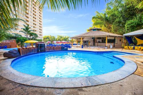 Swimming pool, Golden Dolphin Grand Hotel via Giro ImobTech in Vila Franca Swimming pool, Golden Dolphin Grand Hotel via Giro ImobTech in Vila Franca