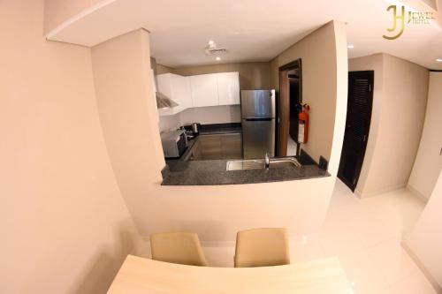 Kitchen, Sunday Luxury Downtown Adliya Formerly Jewel Hotel in Manama Kitchen, Sunday Luxury Downtown Adliya Formerly Jewel Hotel in Manama