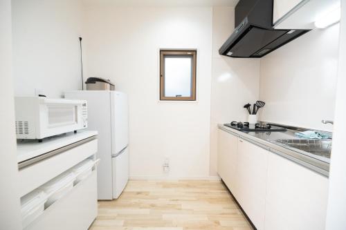 Kitchen, ホテルトーマスみなみ in Itoman Kitchen, ホテルトーマスみなみ in Itoman