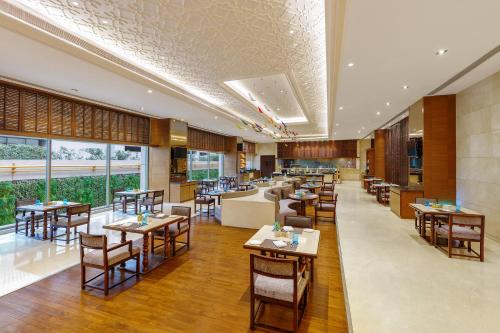 Restaurant, Pride Plaza Hotel, Aerocity New Delhi in New Delhi and NCR Restaurant, Pride Plaza Hotel, Aerocity New Delhi in New Delhi and NCR