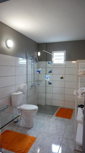 Salle de bain, Appartement cosy à Deshaies avec piscine partagée, 46 m² (Appartement cosy a Deshaies avec piscine partagee, 46 m²) in Deshaies Salle de bain, Appartement cosy à Deshaies avec piscine partagée, 46 m² (Appartement cosy a Deshaies avec piscine partagee, 46 m²) in Deshaies