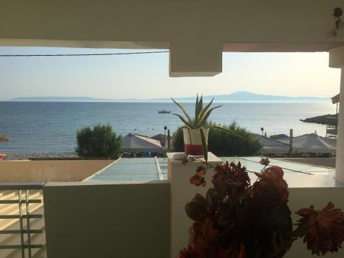 Kilátás, Chic seaside apartment in Akrogiali - 60 sqm - Sea view in Akrogiali Kilátás, Chic seaside apartment in Akrogiali - 60 sqm - Sea view in Akrogiali