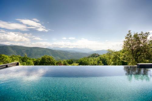 Piscina, Hotel Rural & Spa Mas Prat in La Vall De Bianya Piscina, Hotel Rural & Spa Mas Prat in La Vall De Bianya