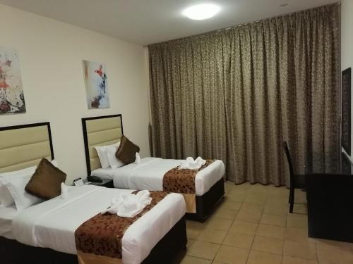 The Al Massa Hotel Apartments 1 near Al Ain International Airport The Al Massa Hotel Apartments 1 near Al Ain International Airport