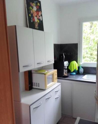 Konyha, Maison charmante à San-Nicolao avec piscine partagée (Maison charmante a San-Nicolao avec piscine partagee) in San Nicolao Konyha, Maison charmante à San-Nicolao avec piscine partagée (Maison charmante a San-Nicolao avec piscine partagee) in San Nicolao