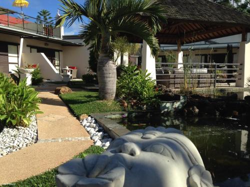 Giardino, Hotel Hibiscus in Kone Giardino, Hotel Hibiscus in Kone