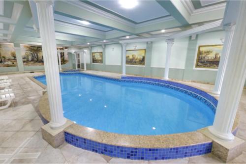 Úszómedence, Virgilius Palace Hotel in Araxa Úszómedence, Virgilius Palace Hotel in Araxa