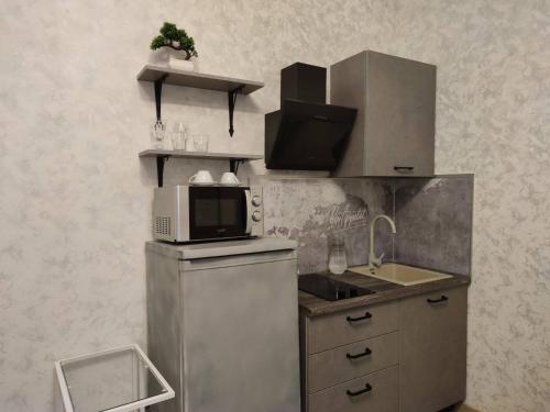 Kitchen, Apartments Light House in Khanty-Mansiysk Kitchen, Apartments Light House in Khanty-Mansiysk
