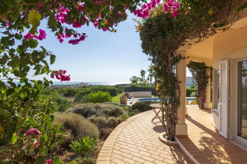 Balcony/terrace, Villa with beautiful see views & spacious garden in Estombar Balcony/terrace, Villa with beautiful see views & spacious garden in Estombar