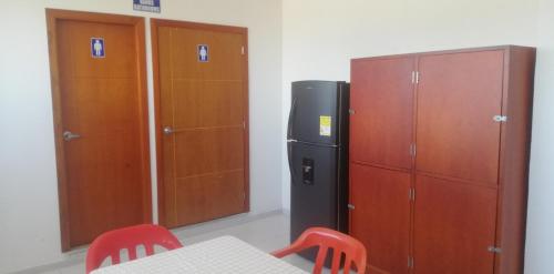 Shared lounge/TV area, Hostal El Recreo in Suroccidente Shared lounge/TV area, Hostal El Recreo in Suroccidente