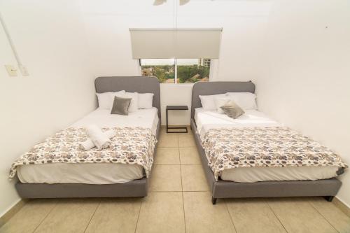 Liverté Condos- Downtown Apartments with Pool