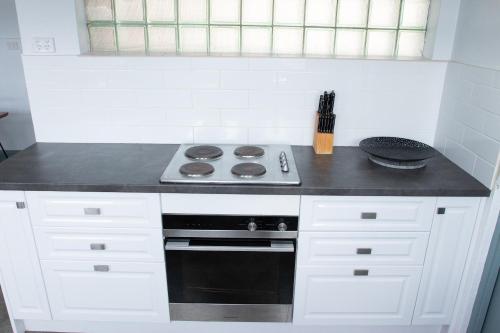 Kitchen, Oasis on Beamish Hotel near Lakemba Mosque Kitchen, Oasis on Beamish Hotel near Lakemba Mosque